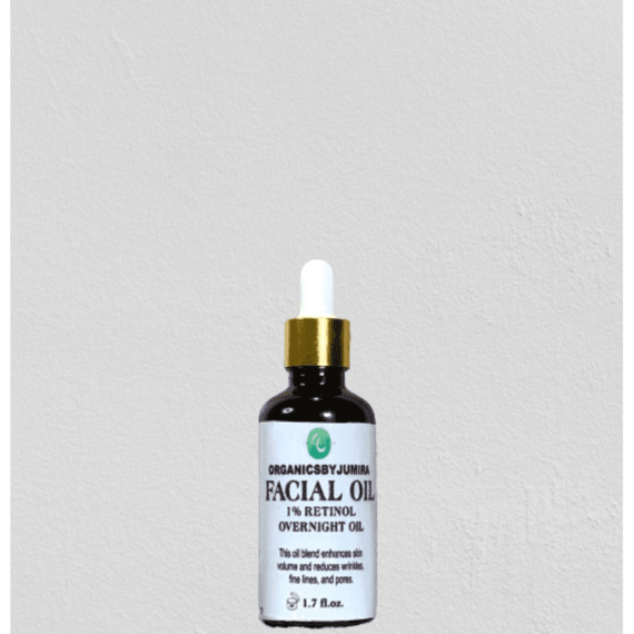 "Organicsbyjumira 1% Retinol Overnight Facial Oil bottle with a dropper, surrounded by key ingredients such as jojoba oil, lavender oil, and rosehip oil, showcasing the natural and organic skincare formulation."